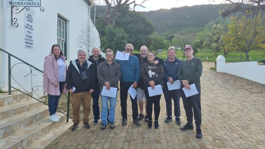 The group at Goedgedacht's welcome sign
