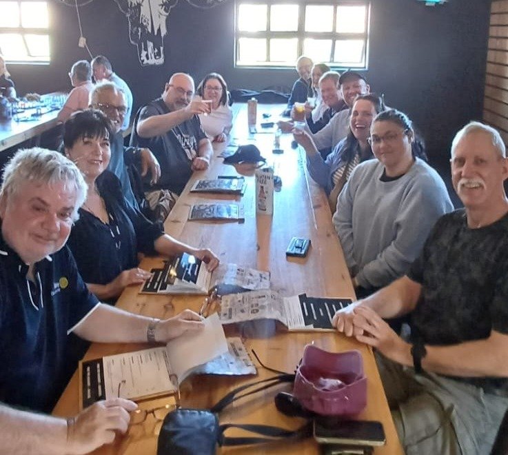 Club lunch along the long communal table at Darling Brew